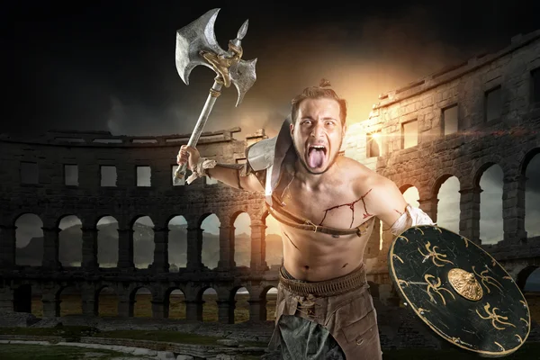 Gladiator warrior in arena — Stock Photo, Image