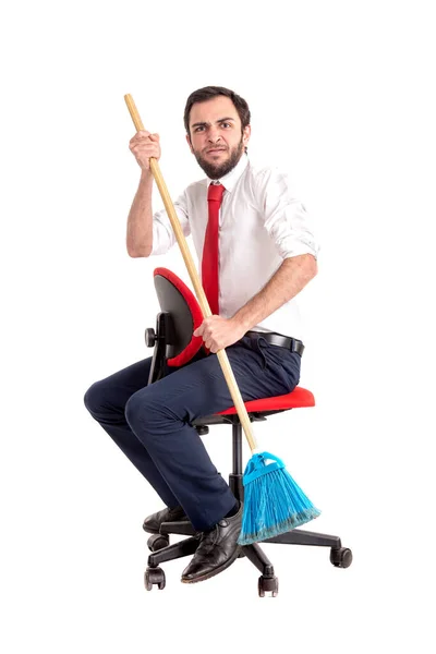 Empresario Remando Con Una Escoba Una Silla Oficina Aislada Blanco — Foto de Stock