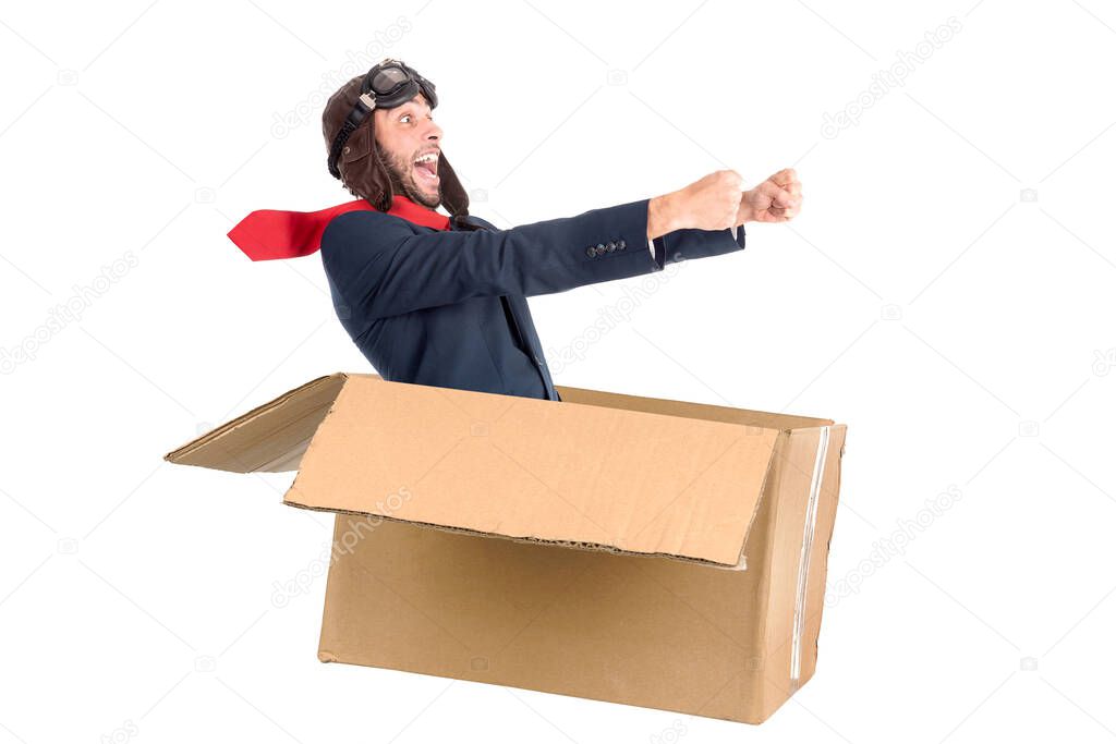 Businessman flying a carboard box isolated in white