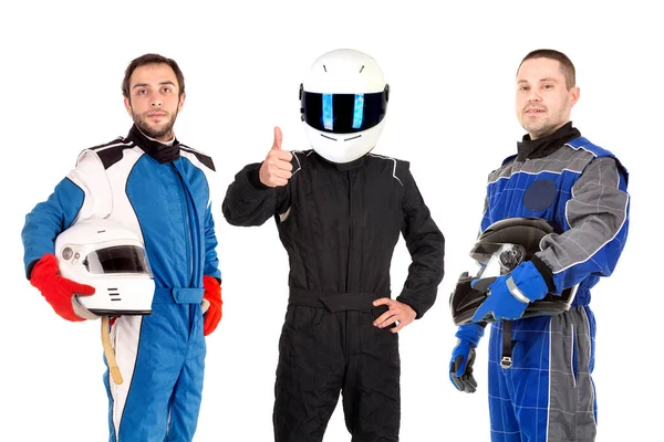 Pilotos Corrida Posando Com Capacetes Isolados Branco — Fotografia de Stock