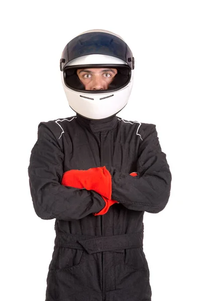 白地に隔離されたヘルメットでポーズレーシングドライバー — ストック写真