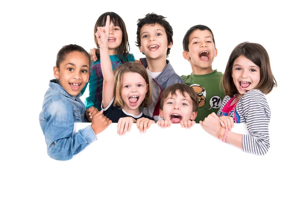 Kids over white board — Stock Photo, Image