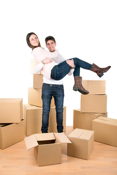 Happy couple with boxes — Stock Photo, Image