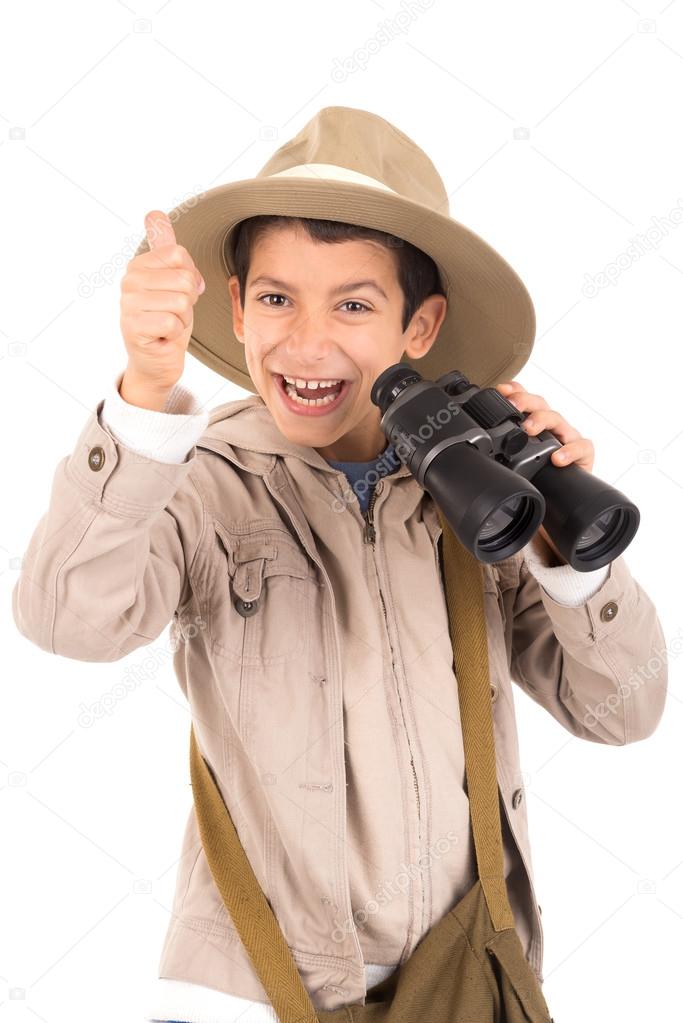 Boy with binoculars playing Safari