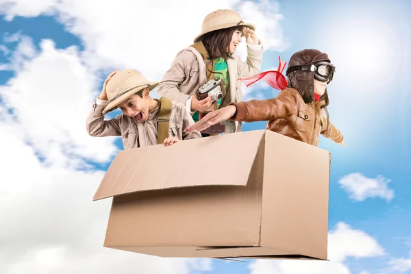Children in a cardboard box — Stock Photo, Image
