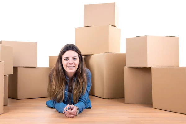 Menina com caixas — Fotografia de Stock