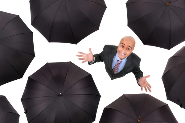 Affärsman med paraplyer — Stockfoto