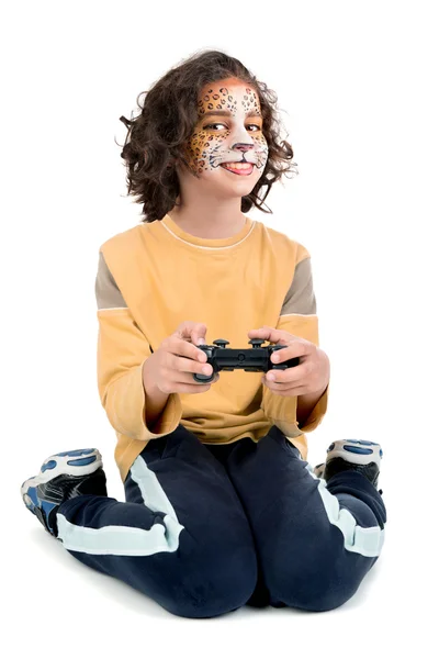 Meisje met geschilderde gezicht. Video games — Stockfoto