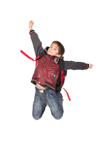 Хлопчик студент стрибки — стокове фото