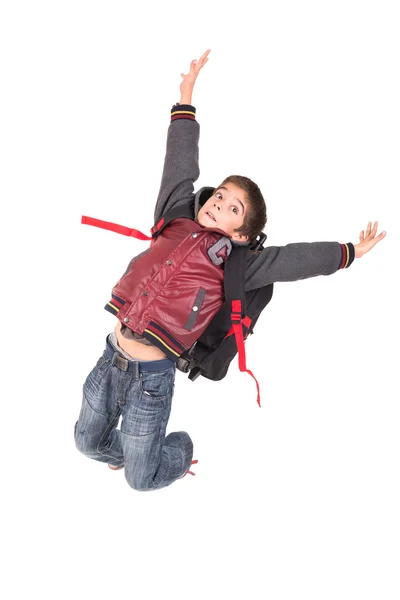 Niño estudiante saltando —  Fotos de Stock