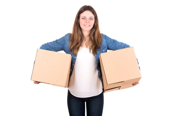 Girl with cardboard box unpacking Stock Photo