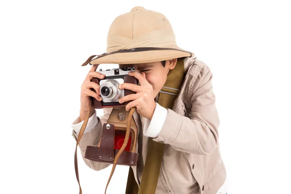 Menino com câmera jogando Safari — Fotografia de Stock