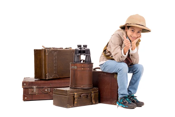 Хлопчик з валізами, грати Safari — стокове фото