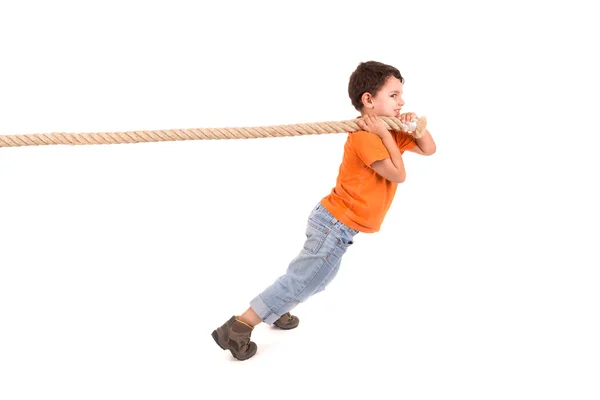 Boy pulling a rope — Stock Photo, Image