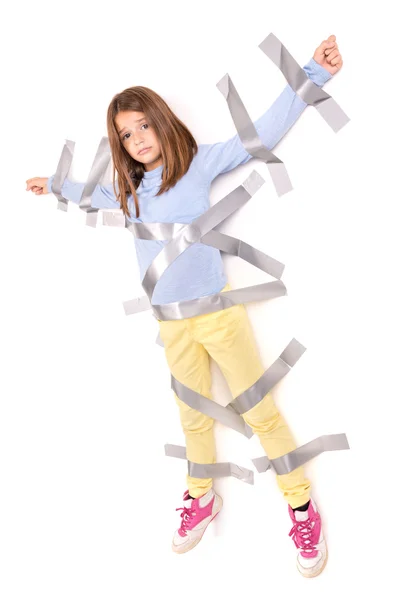 Girl tied to the wall with duct tape — Stock Photo, Image