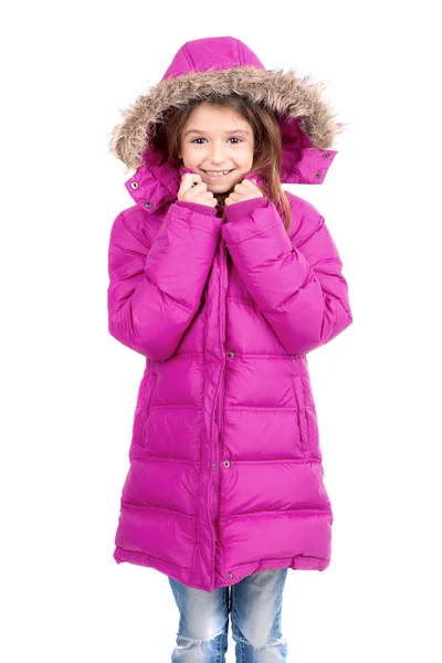 Dívka pózuje s růžový kabát — Stock fotografie