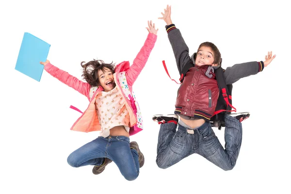 Deux enfants sauteurs sur blanc — Photo