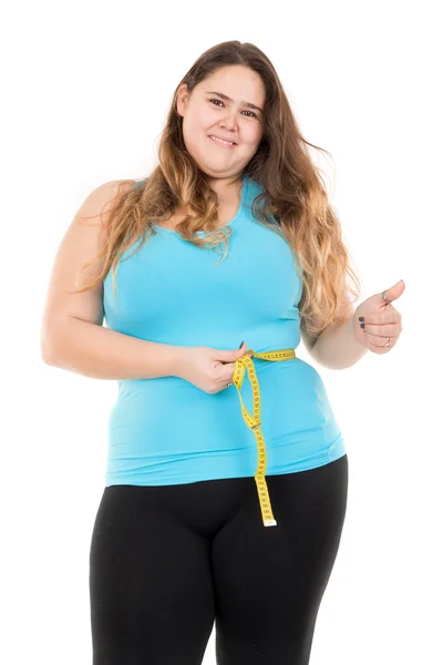 Large girl with measuring tape — Stock Photo, Image