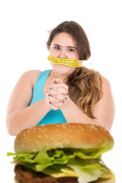 Large girl gagged with measuring tape — Stock Photo, Image