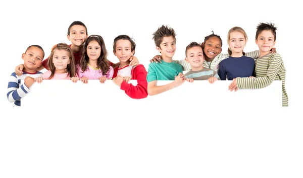 Group of children with blank board — Stock Photo, Image