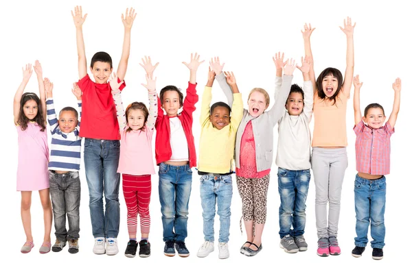 Grupo de niños levantaron las manos — Foto de Stock