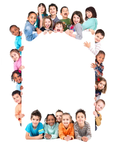 Group of children with blank board — Stock Photo, Image