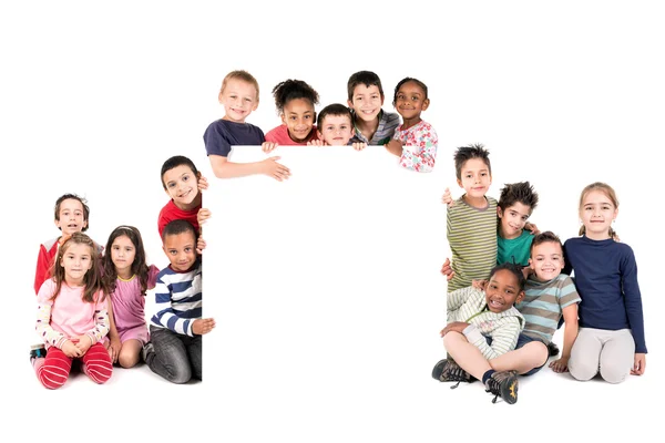 Group of children with blank board — Stock Photo, Image