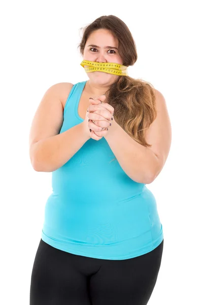 Girl gagged with measuring tape — Stock Photo, Image