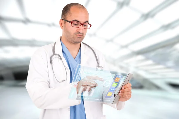 Doctor with futuristic tablet — Stock Photo, Image