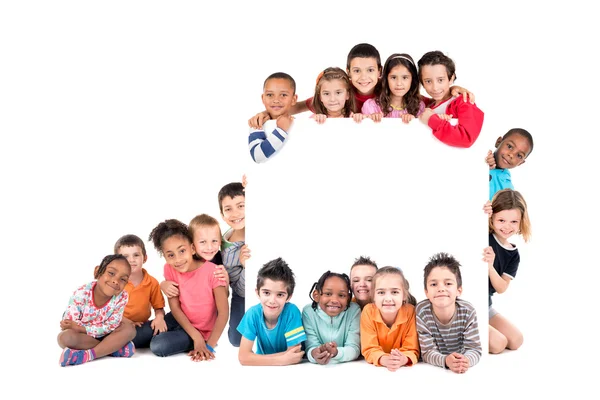 Group of children with blank board — Stock Photo, Image