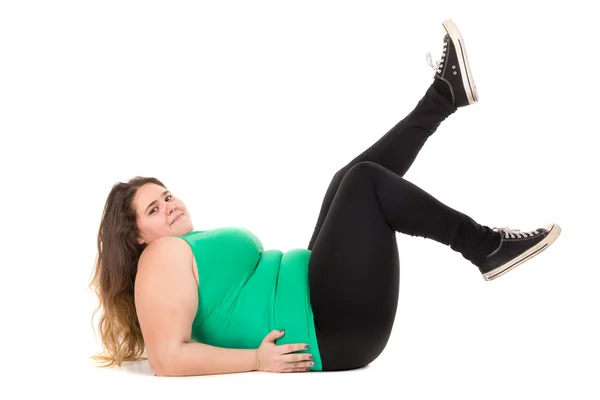 Grote meisje doen fitness — Stockfoto