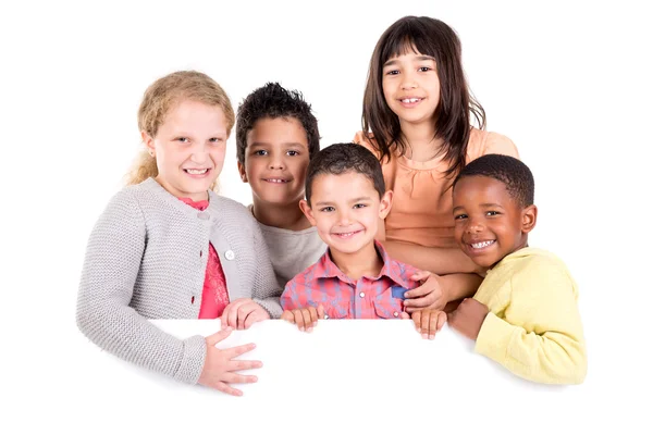 Grupo de niños con tablero en blanco —  Fotos de Stock