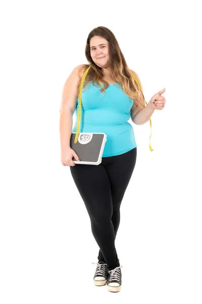 Large girl with scale — Stock Photo, Image