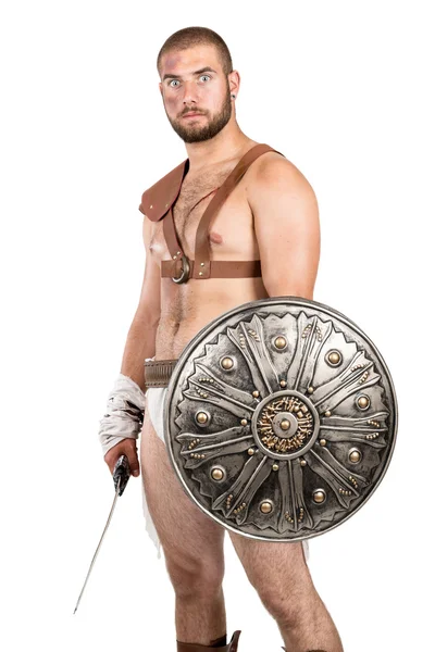 Gladiatorenmann mit Waffe — Stockfoto