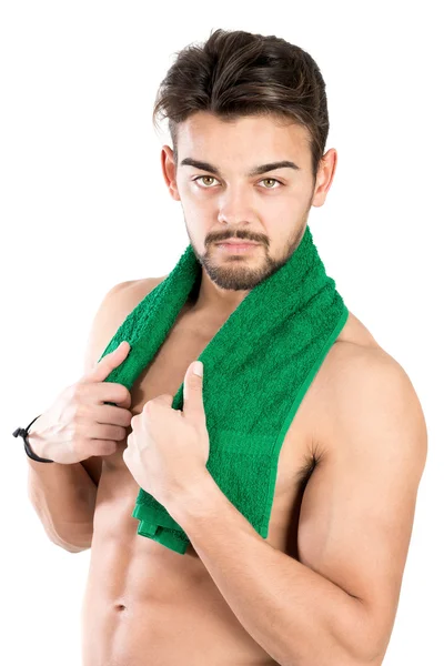 Fitness man posing with towel — Stock Photo, Image