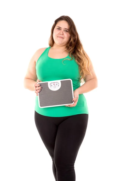 Large girl with scale — Stock Photo, Image