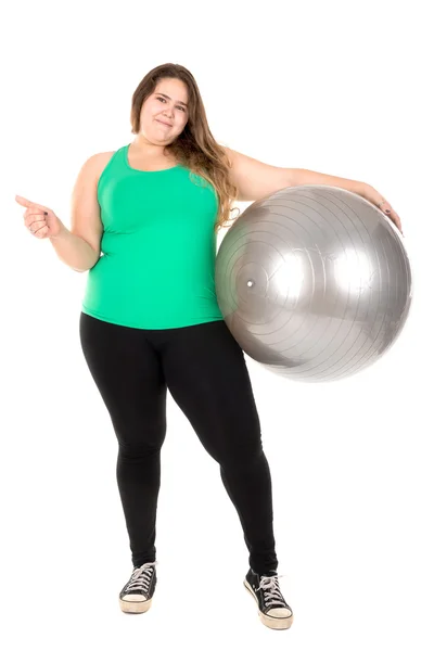 Chica grande con bola de ejercicio — Foto de Stock