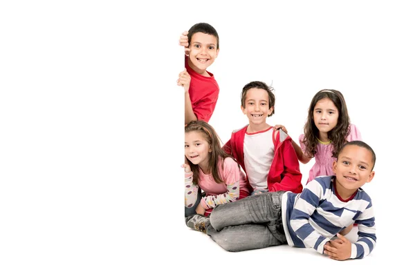 Group of children at white board — Stock Photo, Image