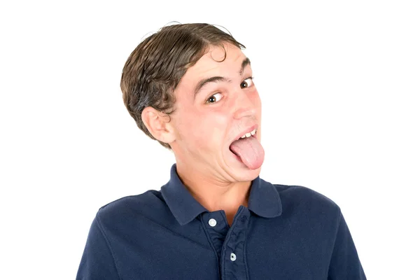 Crazy teen boy showing tongue — Stock Photo, Image