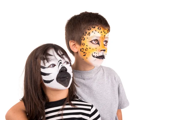 Chica y niño con tigres y máscaras de cebra — Foto de Stock