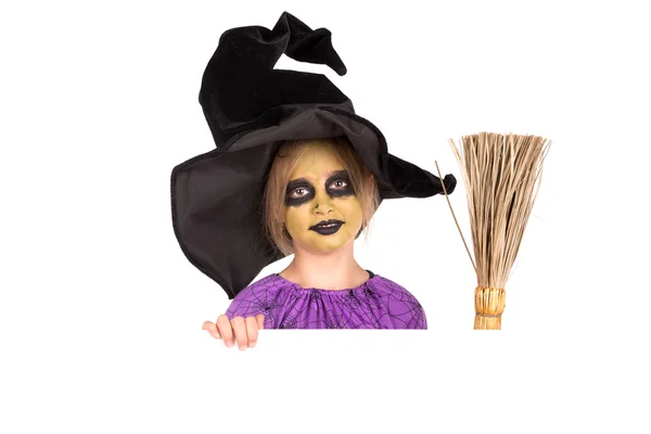 Young girl in Halloween witch costume — Stock Photo, Image