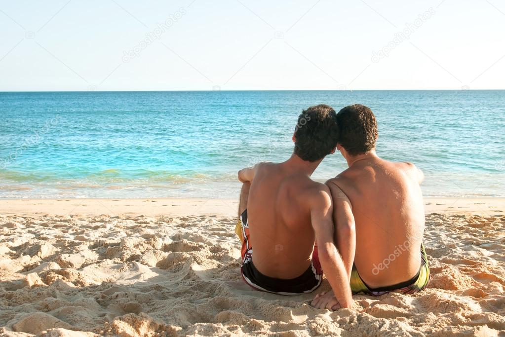 Boys couple at the beach