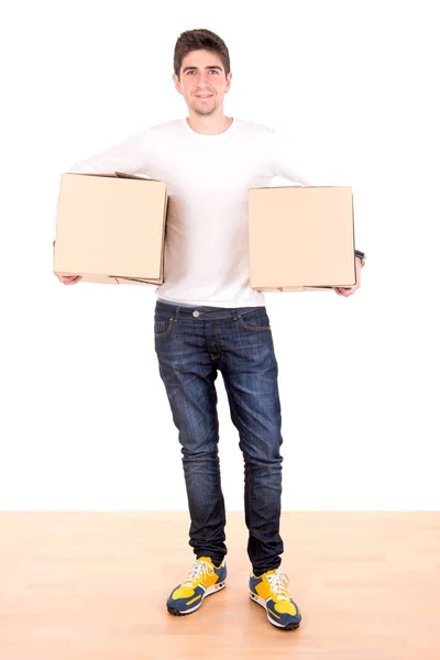 Joven con cajas de cartón — Foto de Stock