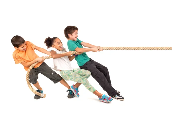 Children group pulling rope — Stock Photo, Image