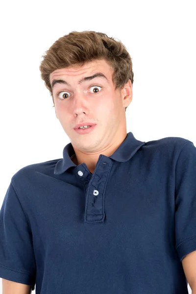 Teenage boy grimacing — Stock Photo, Image