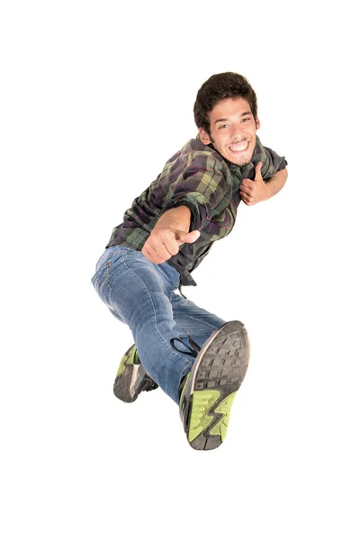 Saltando feliz jovem rapaz — Fotografia de Stock