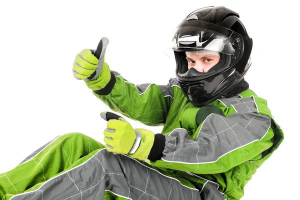 Racing driver driving in helmet Stock Picture