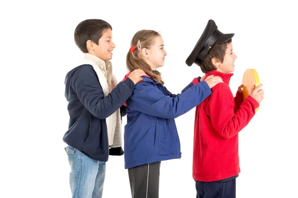 Niños jugando a conducir en transporte — Foto de Stock