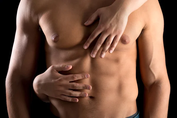 Man's body with woman hands — Stock Photo, Image