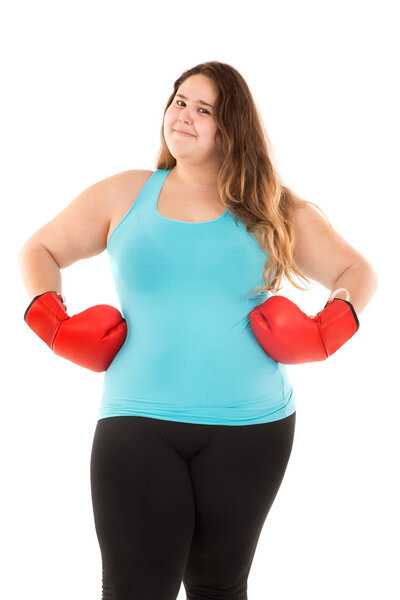 Large girl wearing boxing gloves
